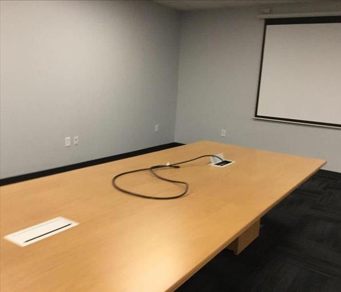 restored conference room after water damage
